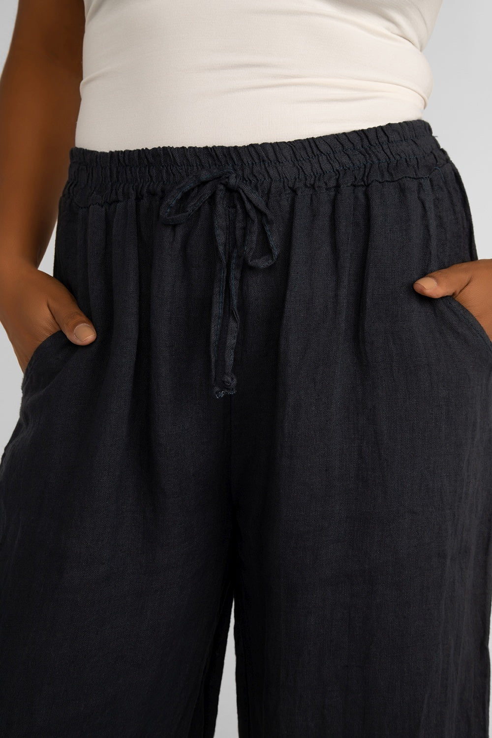 Front close up of Carre Noir (6942) Women's Pull On Wide Leg Linen Pants with Pockets in Navy