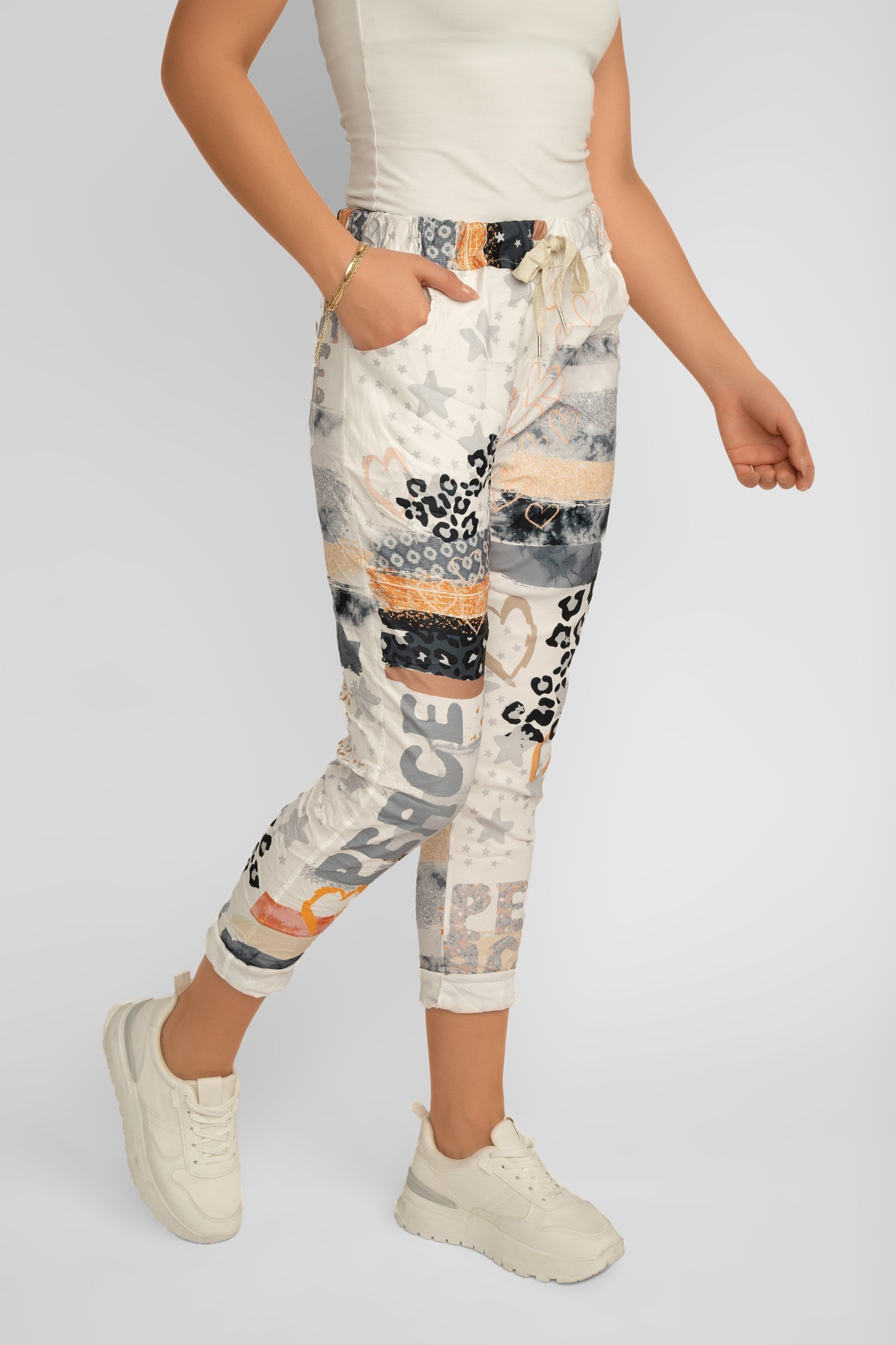 Bella Amore Women's Cropped Multi Print Pull-On Pants in a grey and multicoloured patchwork print