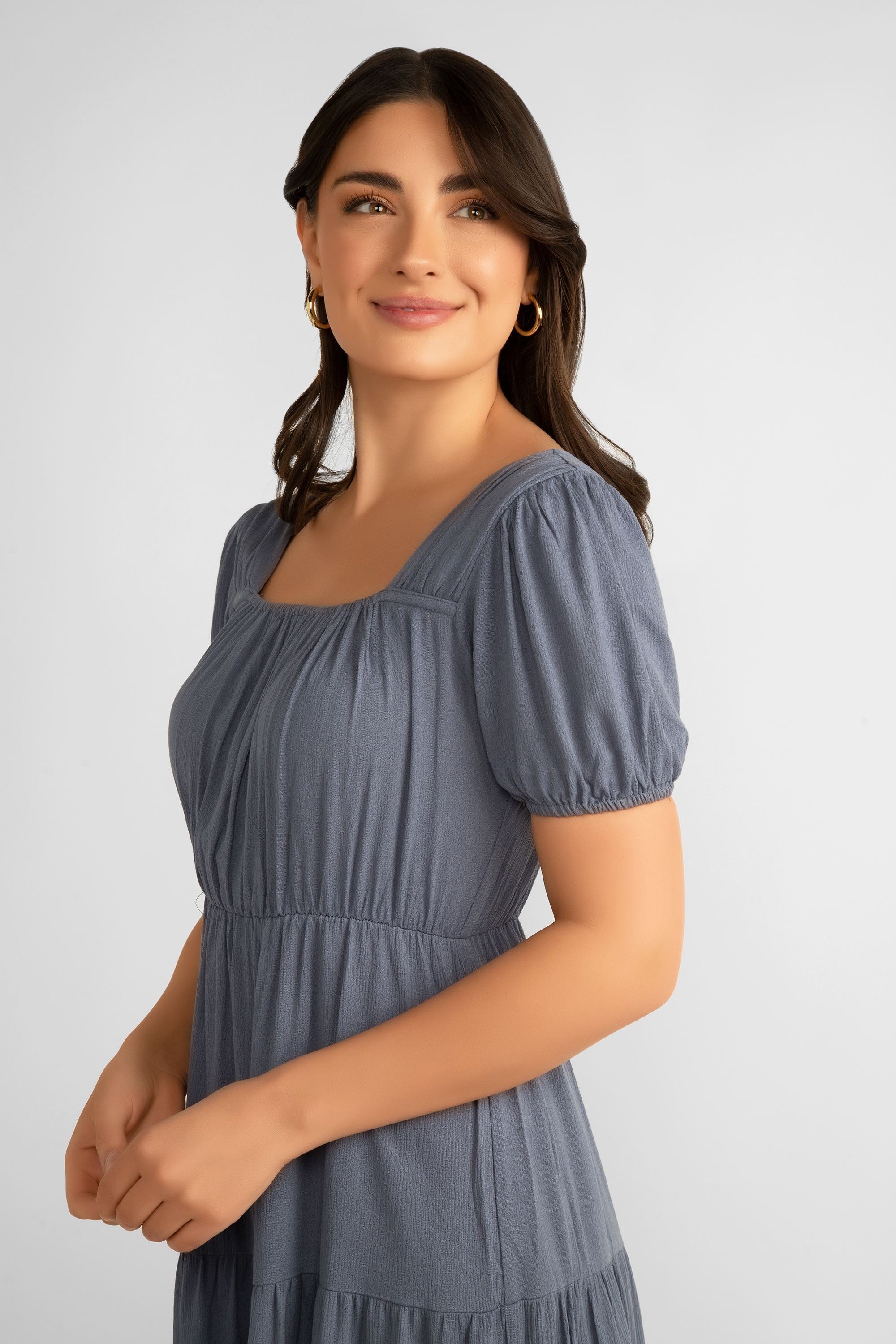 Side close up of Pink Martini (DR-230524) Women's Square Neck, Short Puff Sleeve Tiered Midi Dress in Blue