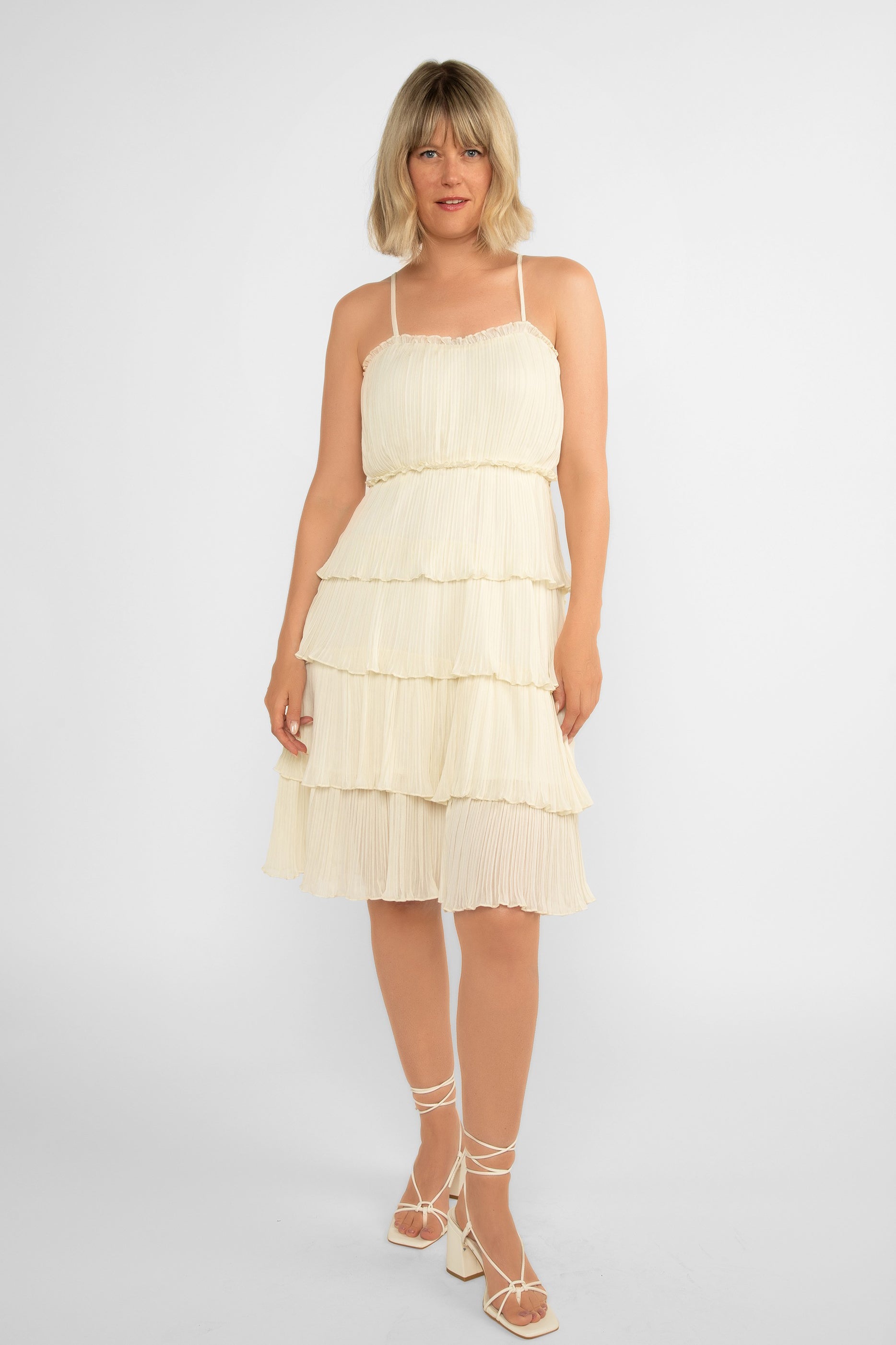 Front view of LATE (DR-6918391) Nikita Dress - Women's Sleeveless with Spaghetti Strap Knee Length Dress - lined pleated chiffon, layered knee length skirt in Off White