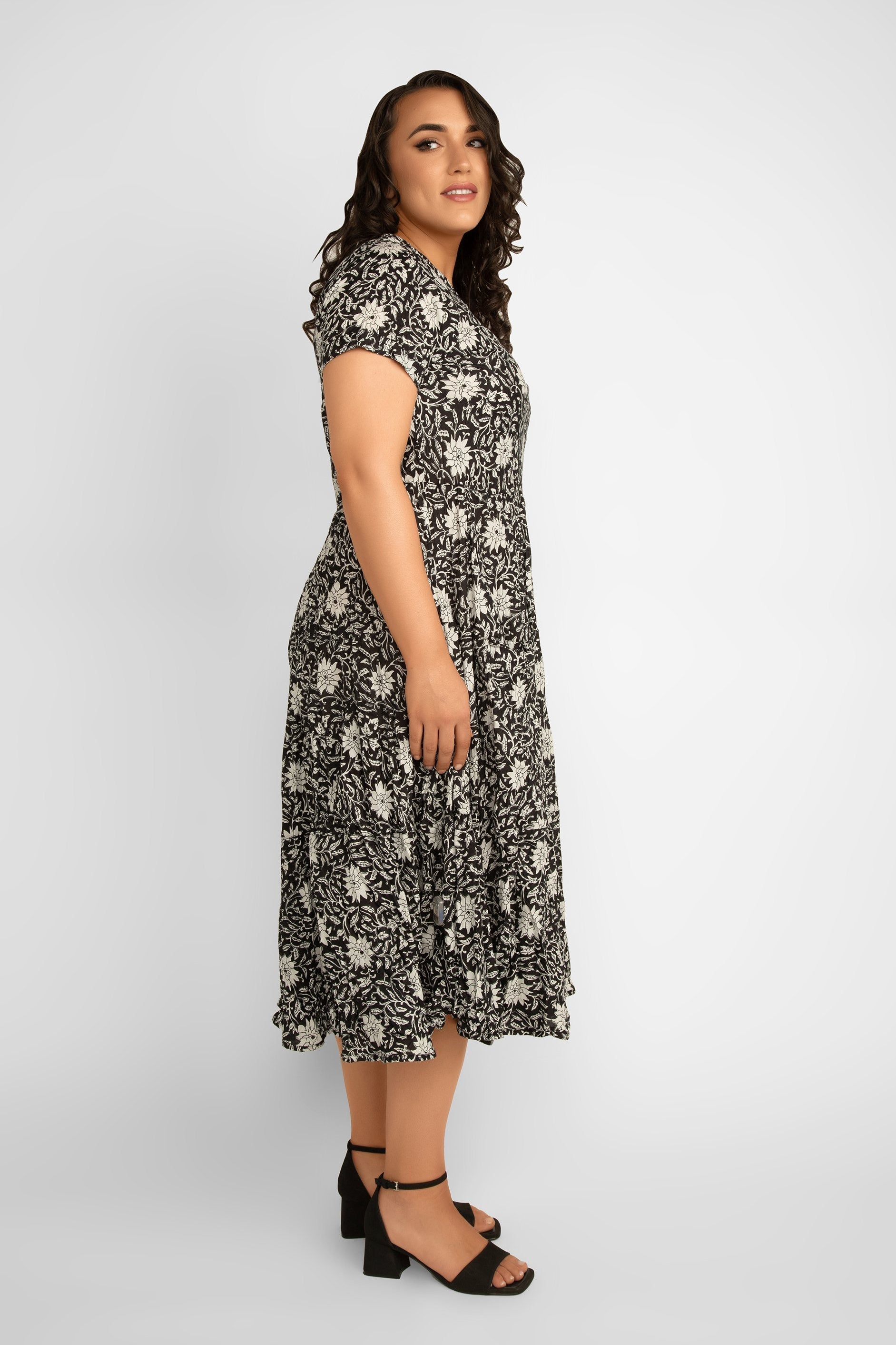 Dress Addict Jazi Short Sleeve V-Neck Tiered Midi Dress with Pockets in Black & White floral print