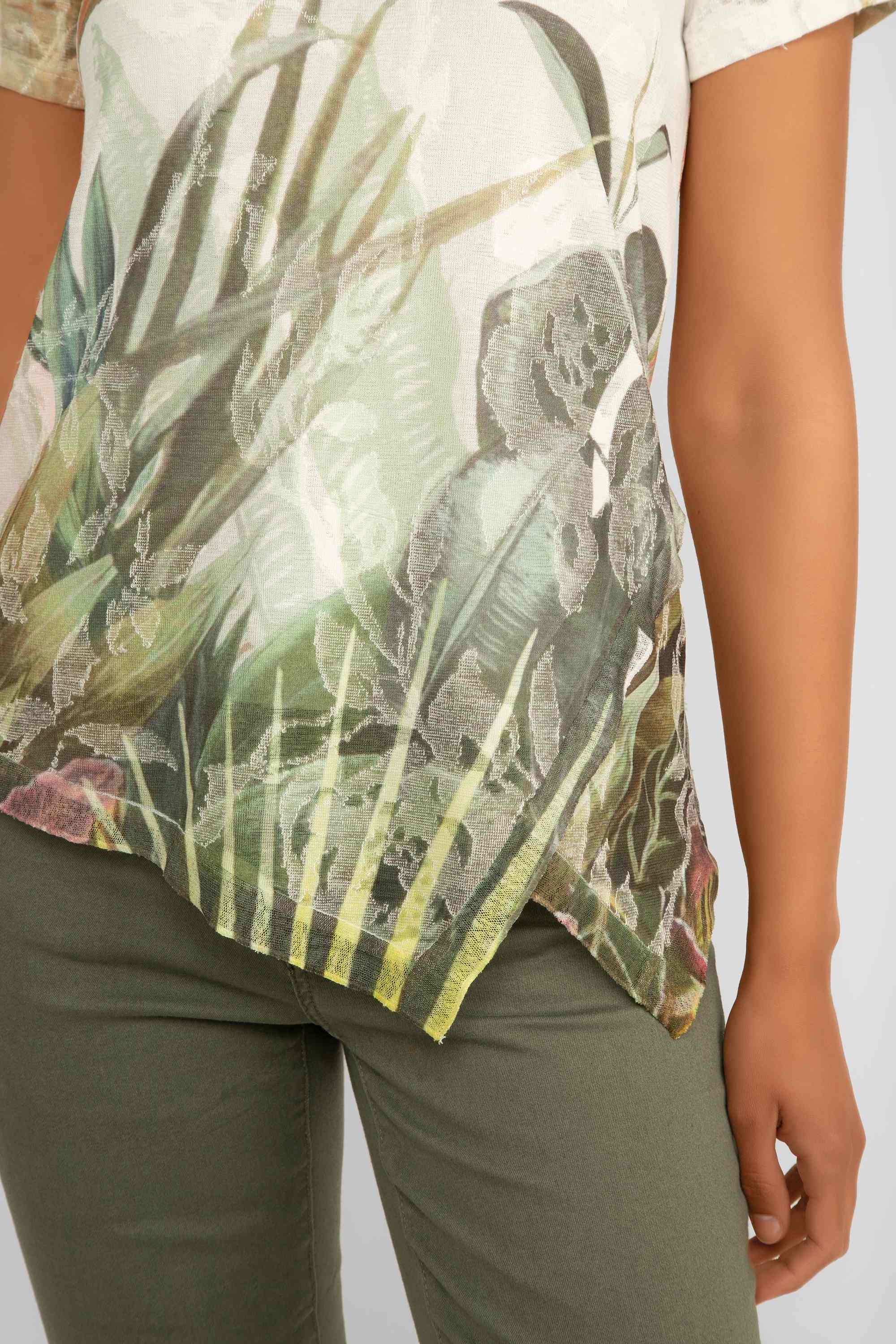 Picadilly (JC765SK) Women's Short Sleeve Asymmetrical Hem Top With an artichoke green foliage print over a cream background