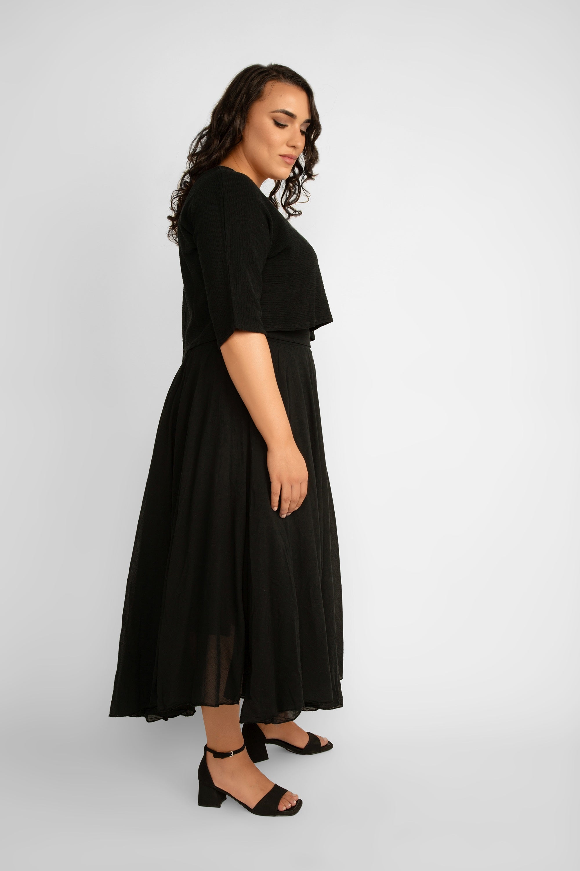Side view Me & Gee (L-6759) Flowy Cotton Maxi Skirt in Black