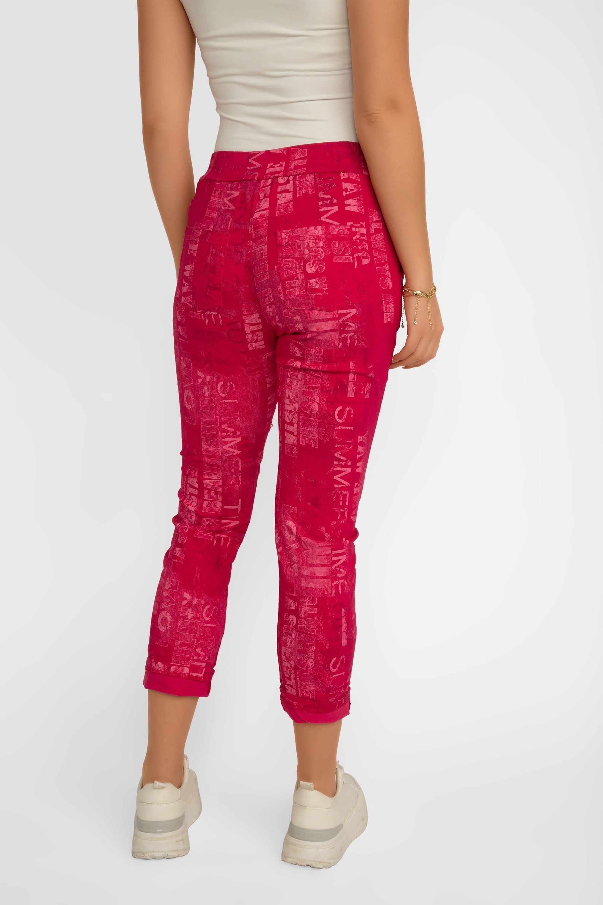 Back view of Elissia (L21026) Women's Pink Font Print Slim Fit, Cropped Crinkle Pants in Fuchsia