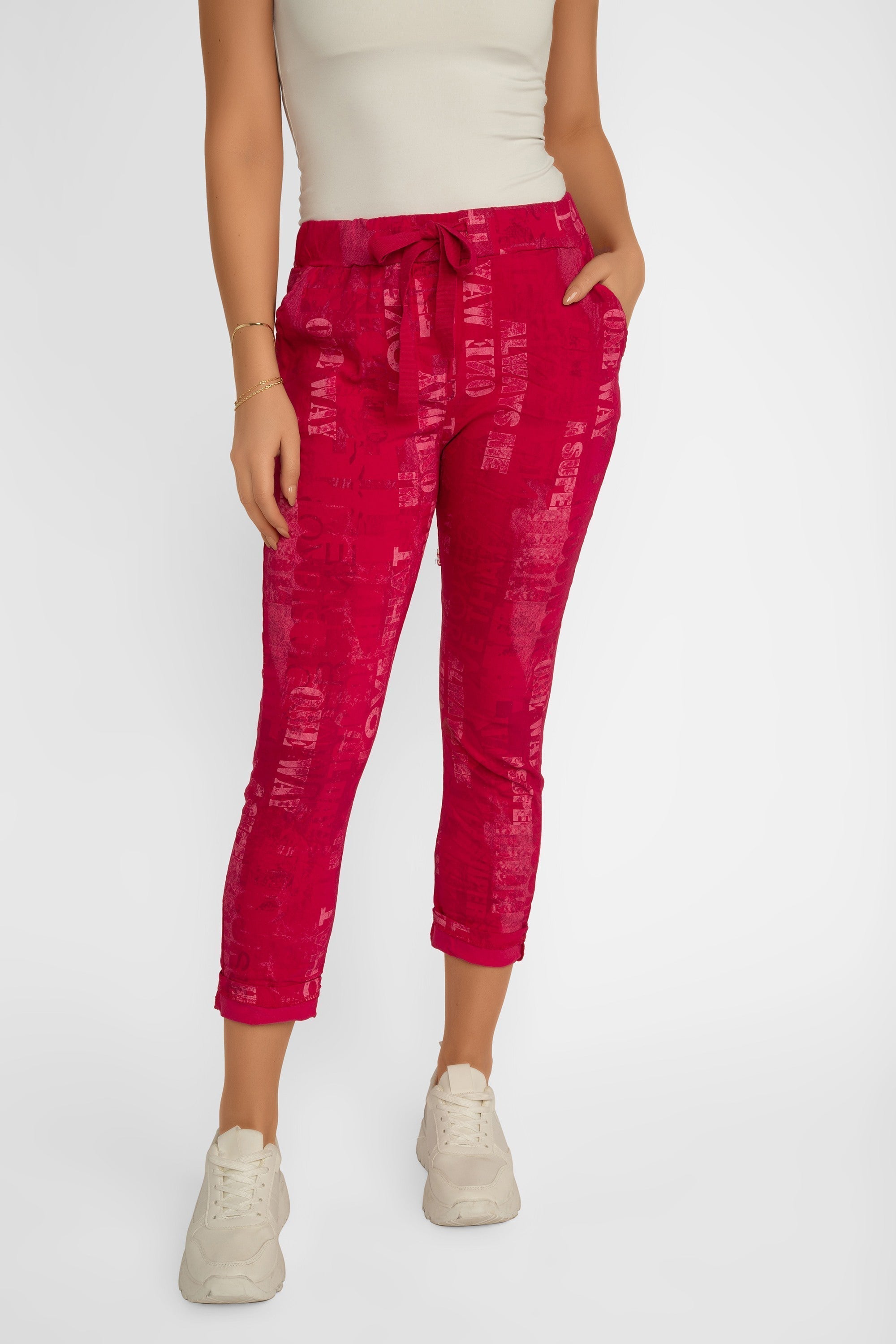 Frotn view of Elissia (L21026) Women's Pink Font Print Slim Fit, Cropped Crinkle Pants in Fuchsia