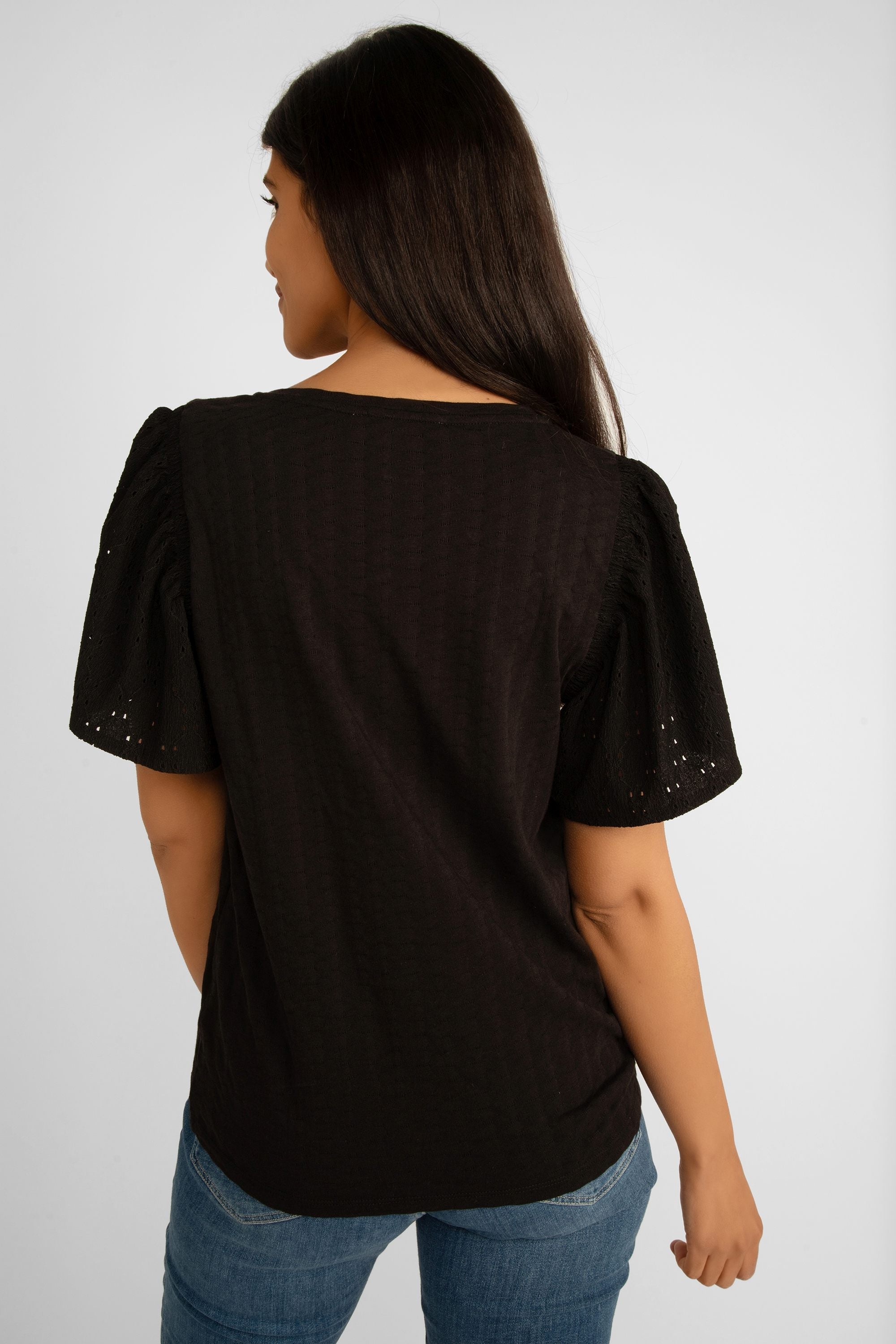 Back view of Garcia (P40209) Women's Textured Short Flounce Sleeve Top with V-neck in Black