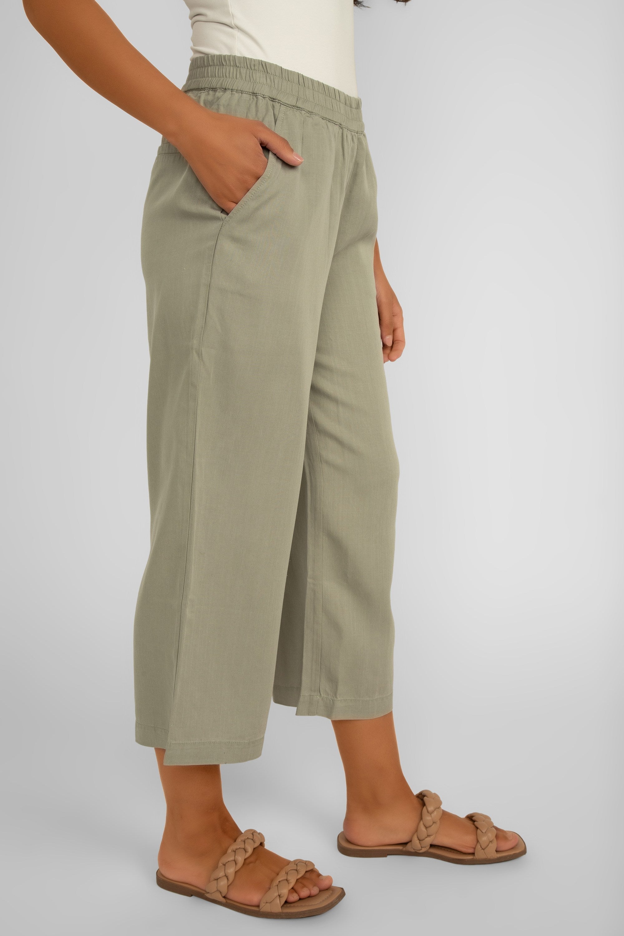 Side view of Renuar Clothing (R8089-E2142) Women's Cropped Wide Leg Pull-On Tencel Pants in Aloe Green