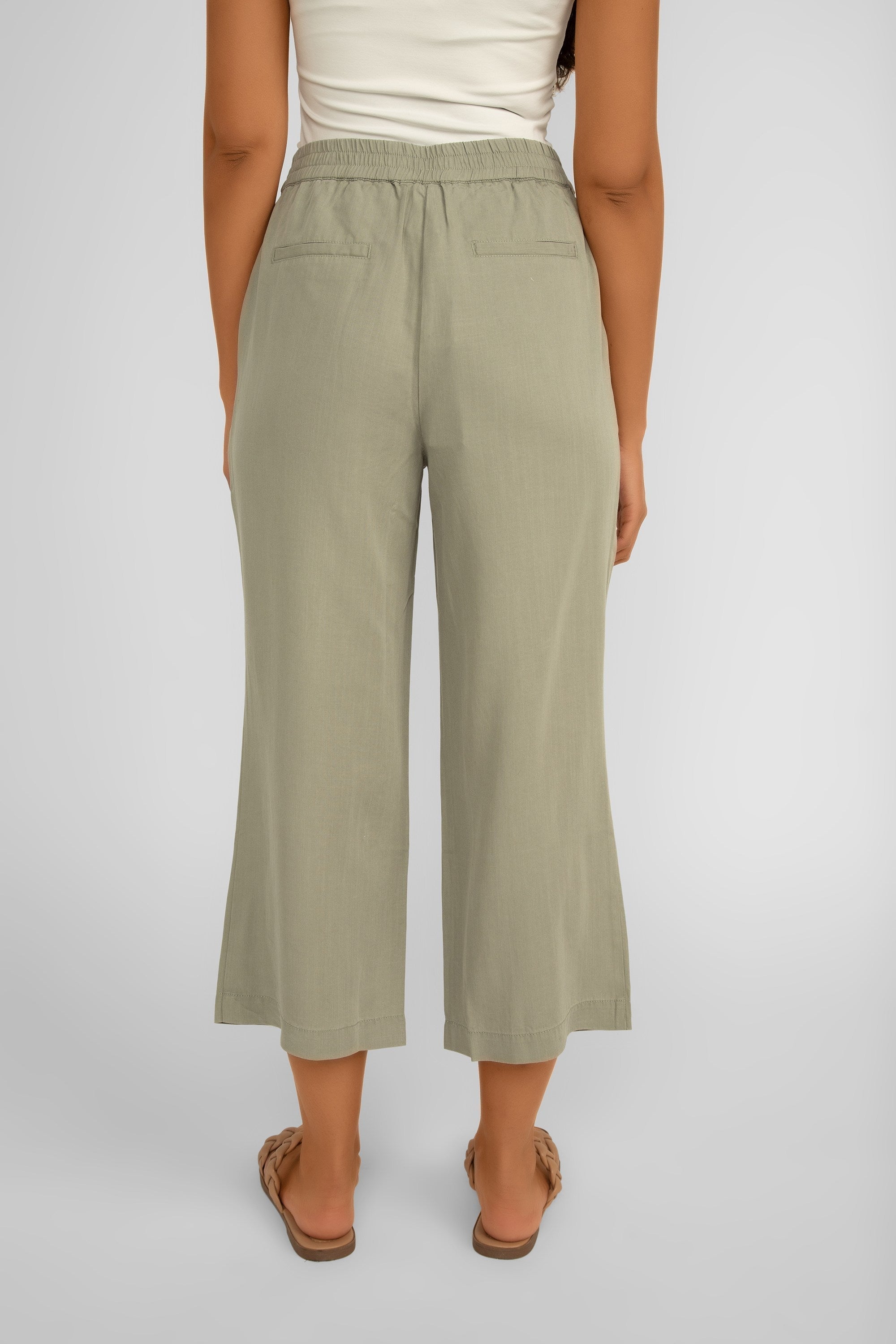 Back view of Renuar Clothing (R8089-E2142) Women's Cropped Wide Leg Pull-On Tencel Pants in Aloe Green