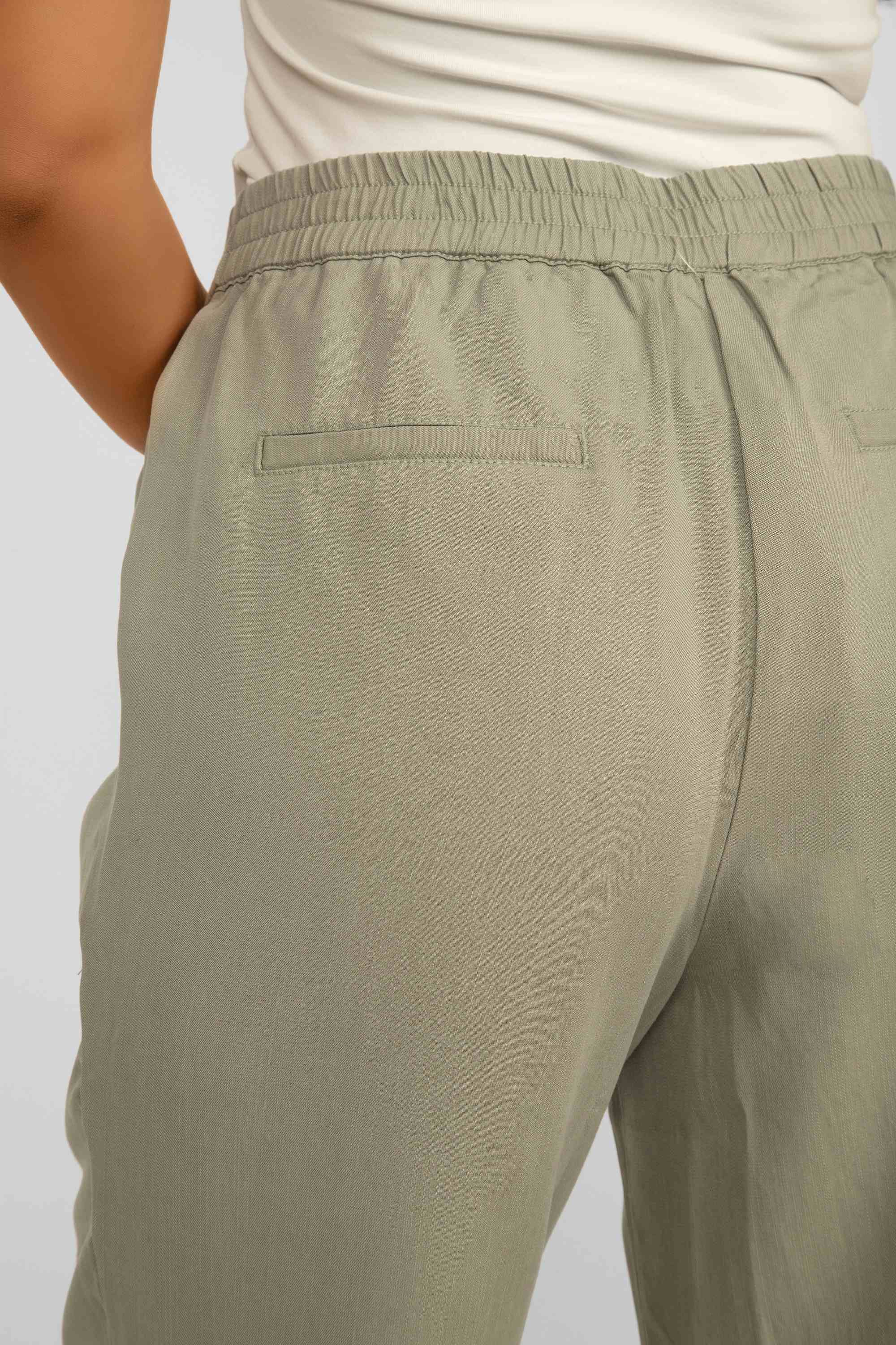 Back close up of Renuar Clothing (R8089-E2142) Women's Cropped Wide Leg Pull-On Tencel Pants in Aloe Green