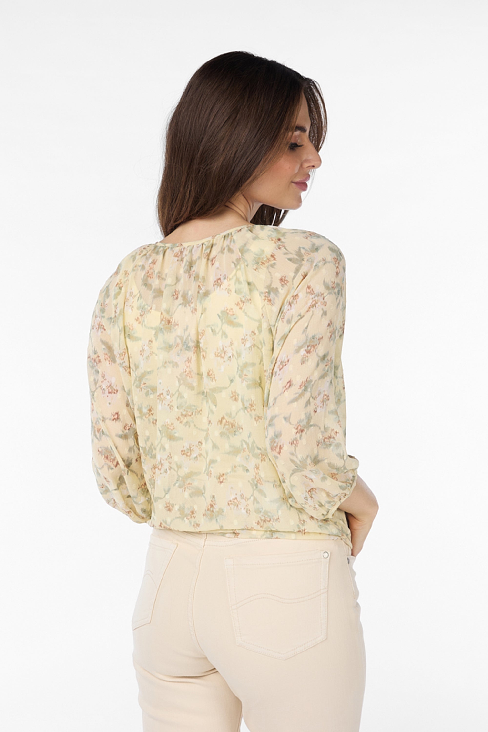 Back view of Esqualo (SP2414042) Women's  3/4 Raglan Sleeve Floral Blouse with split v-neck in a cream floral print