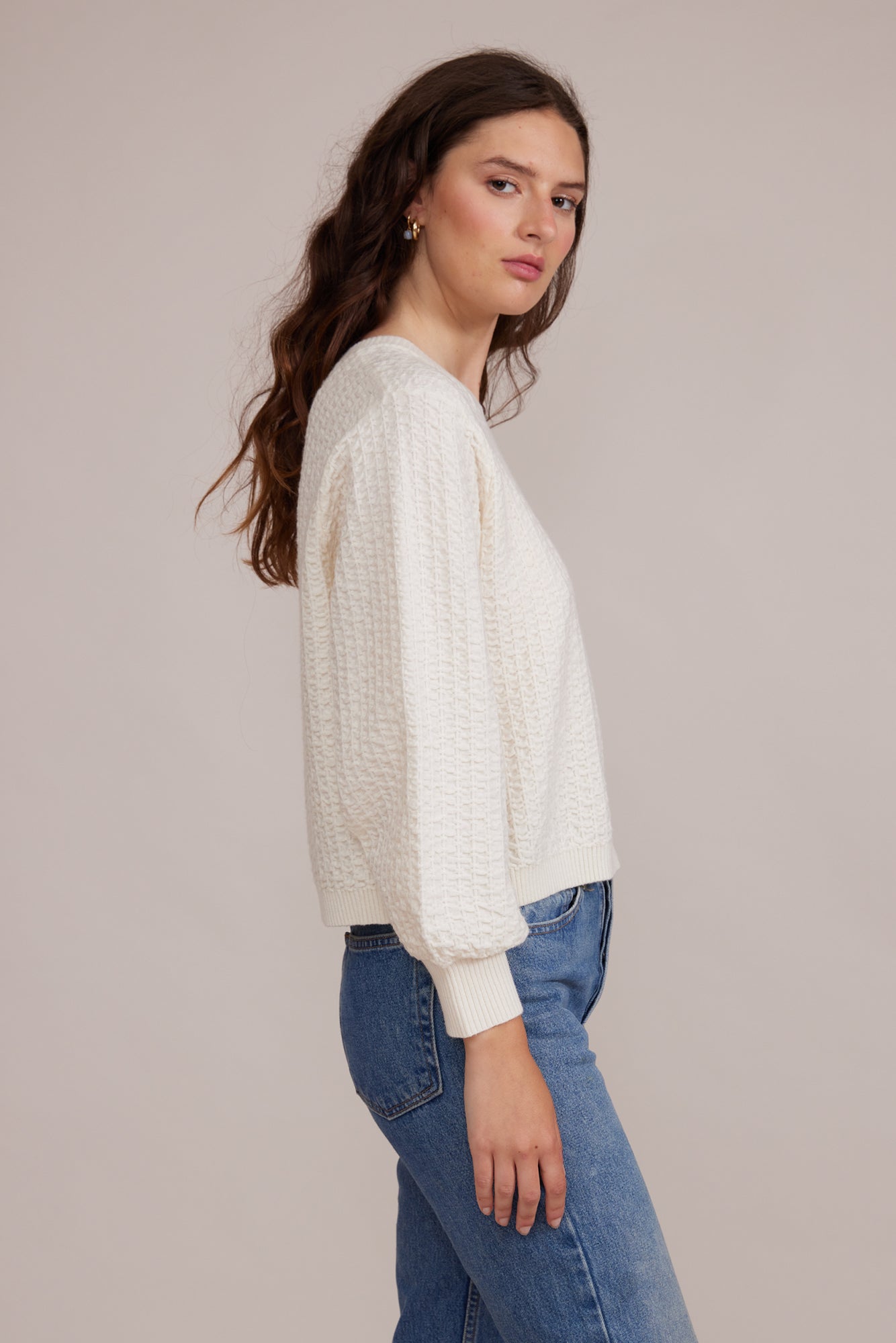 Side view of Lucy Paris (SW2953) Women's Long Sleeve Crew Neck Textured Percy Sweater in Cream