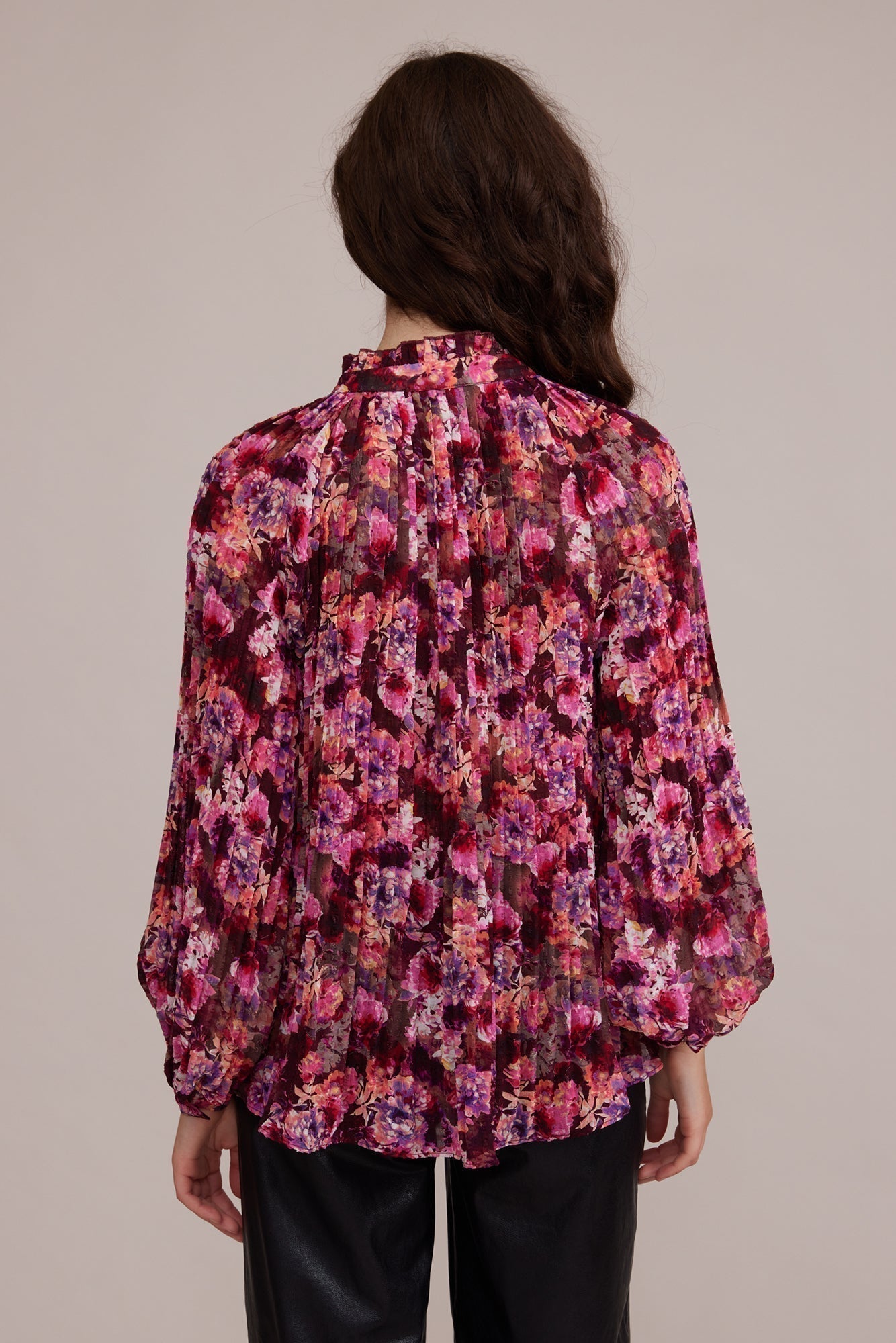 Back view of Lucy Paris (T2538-8) Women's Long Sleeve Pleated Chiffon Blouse with Split V-neck and Tie in Magenta Pink Floral Print