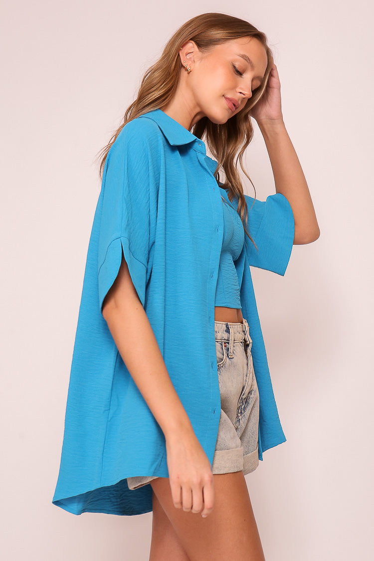 Side view of Timing (WN10311) Women's Short Dolman Sleeve Button Down Shirt with Shirt Collar in Blue