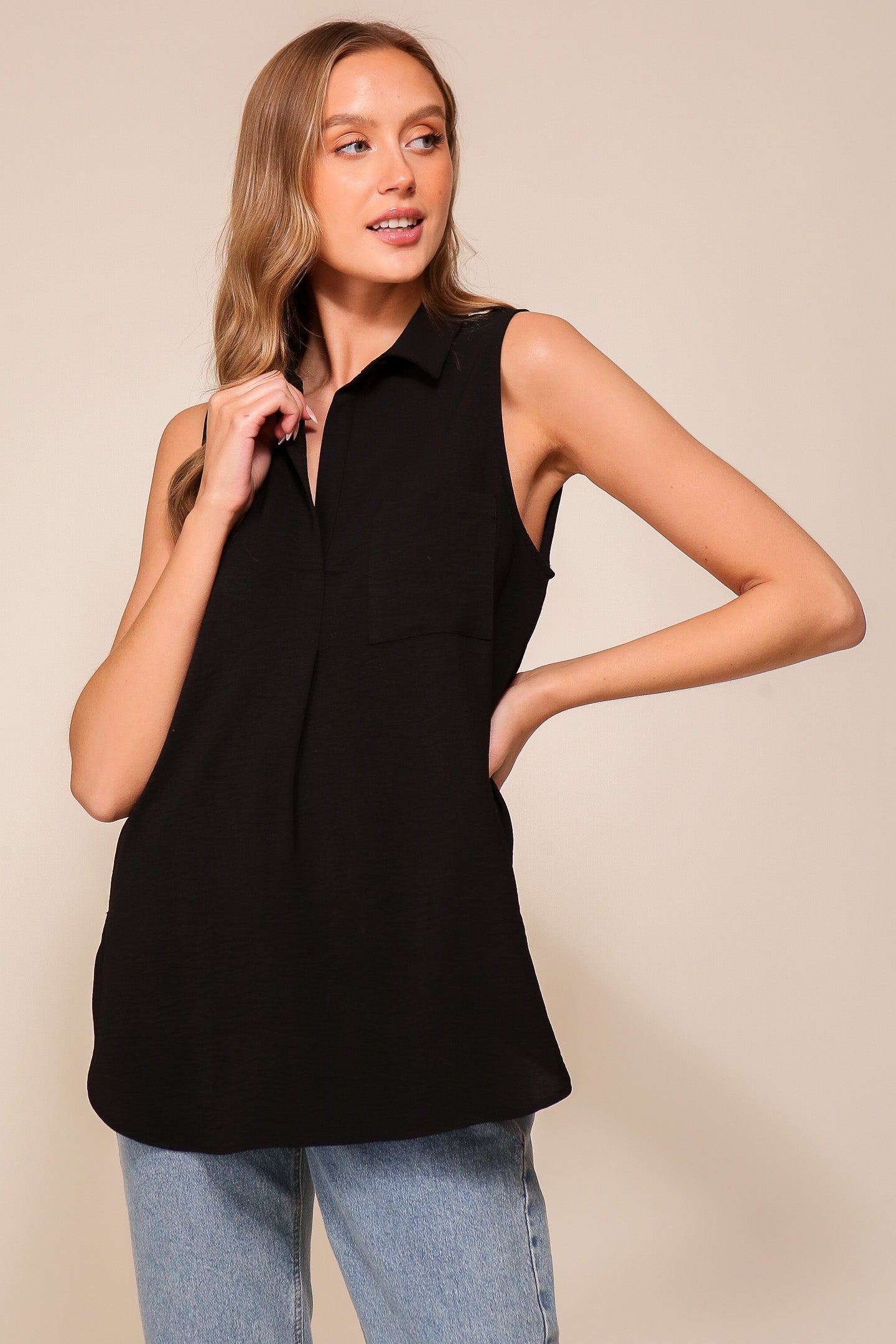 Front view of Timing (WN9713) women's Sleeveless Collared V-Neck Top with Chest Pocket and Flared Silhouette in Black 
