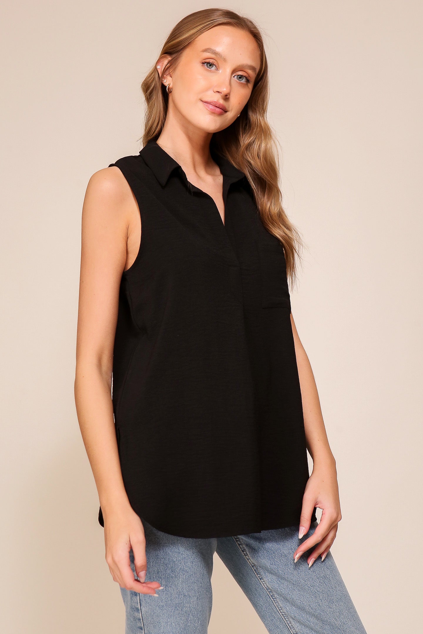Front view of Timing (WN9713) women's Sleeveless Collared V-Neck Top with Chest Pocket and Flared Silhouette in Black 
