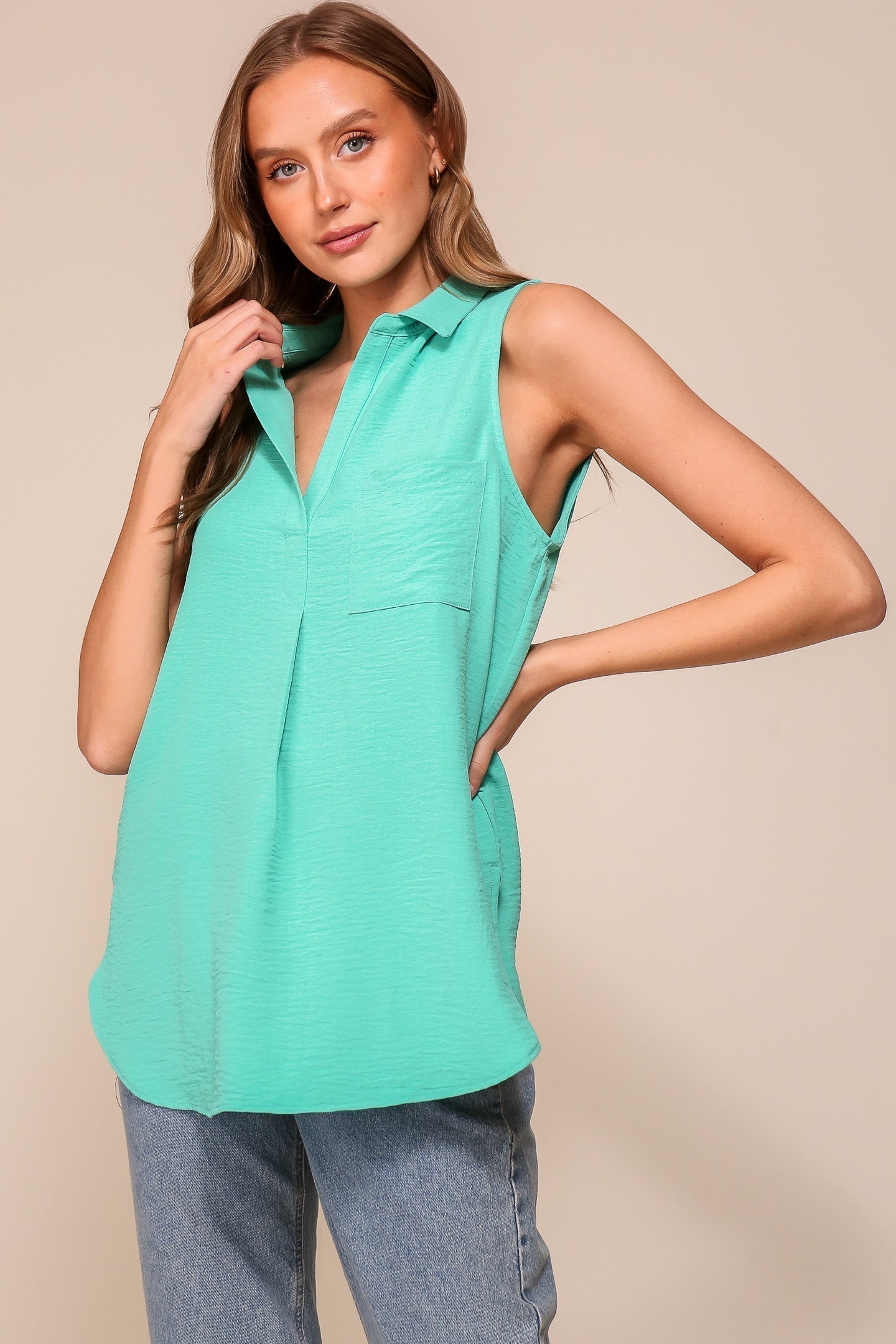 Timing (WN9713) women's Sleeveless Collared V-Neck Top with Chest Pocket and Flared Silhouette in Jade Green