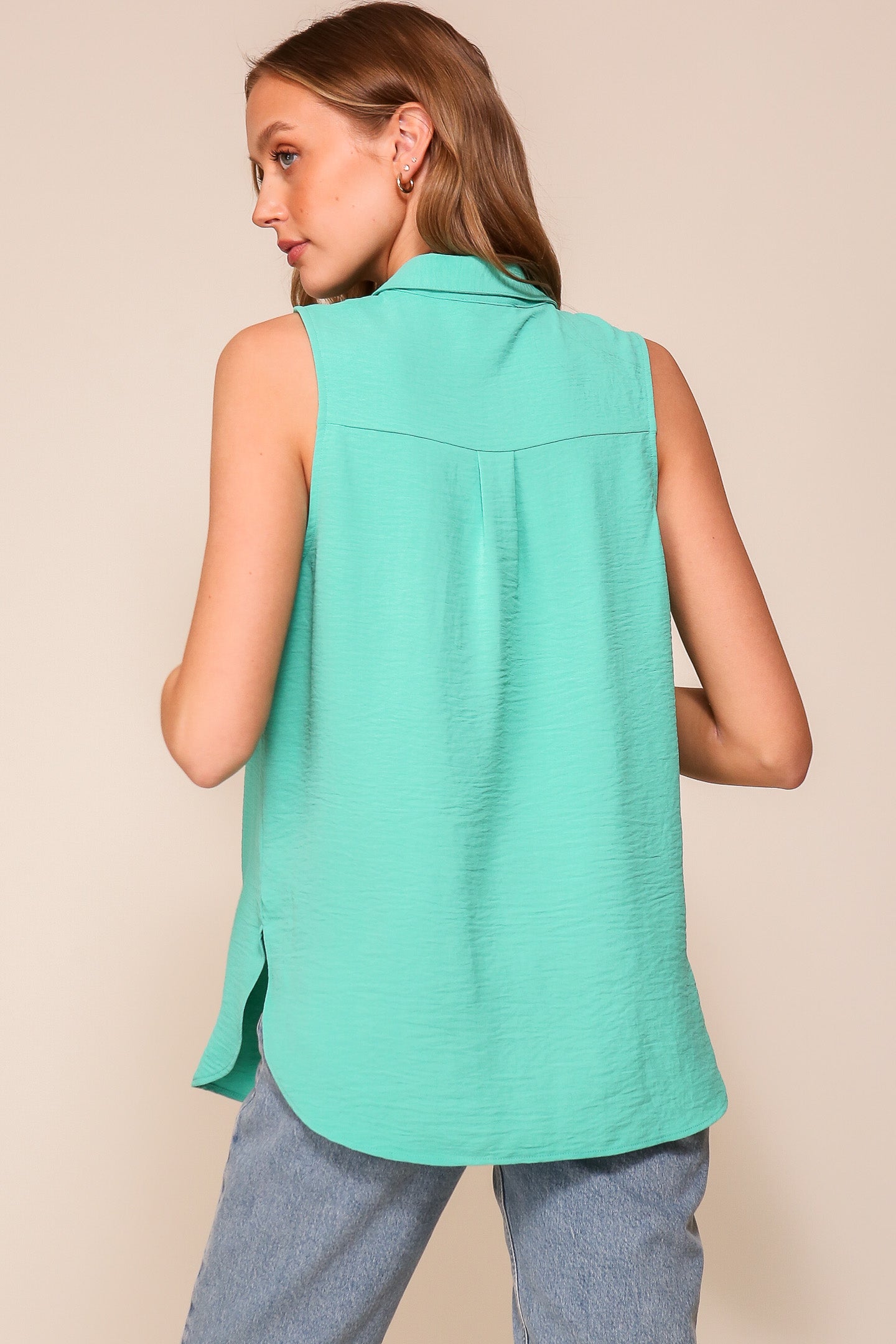 Back view of Timing (WN9713) women's Sleeveless Collared V-Neck Top with Chest Pocket and Flared Silhouette in Jade Green