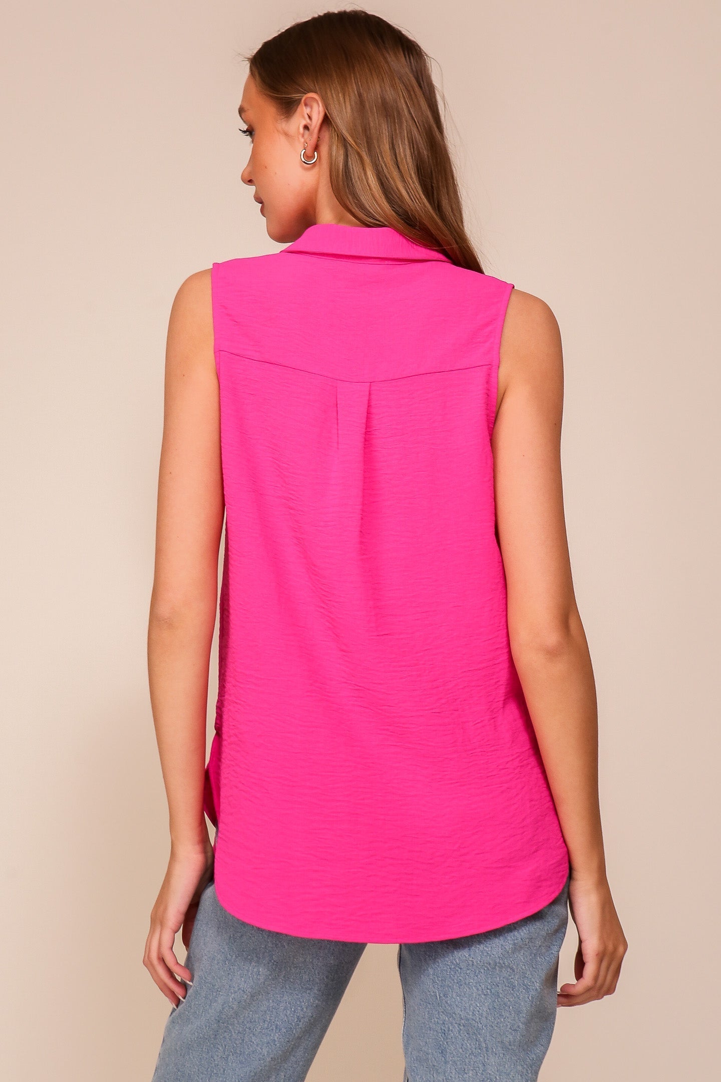 Back view of Timing (WN9713) women's Sleeveless Collared V-Neck Top with Chest Pocket and Flared Silhouette in PInk